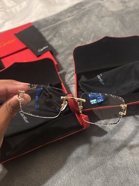 Cartier Rimless Sunglasses with Gold Accents and Black Lenses